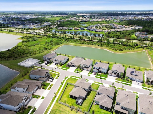33287 Sycamore Leaf Dr, Wesley Chapel, FL 33545 - aerial perspective of suburban area featuring a large body of water