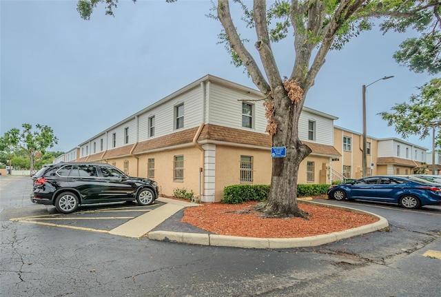4708 Michael Ct Unit 104, Tampa, FL 33614 - view of front of home featuring uncovered parking