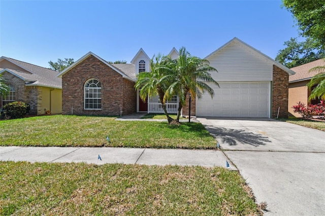 9709 Bay Colony Dr, Riverview, FL 33578 - ranch-style home with brick siding, driveway, a garage, and a front lawn
