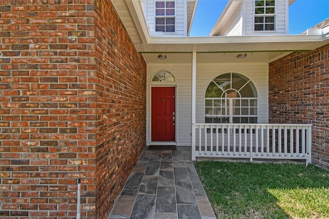 9709 Bay Colony Dr, Riverview, FL 33578 - entrance to property with a porch and brick siding