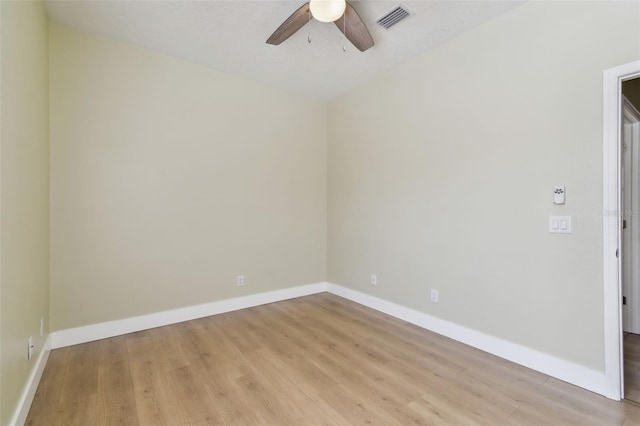 9709 Bay Colony Dr, Riverview, FL 33578 - unfurnished room with light wood-style flooring, ceiling fan, and baseboards
