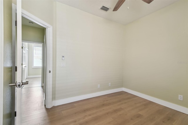 9709 Bay Colony Dr, Riverview, FL 33578 - unfurnished room featuring a ceiling fan, light wood-type flooring, and baseboards