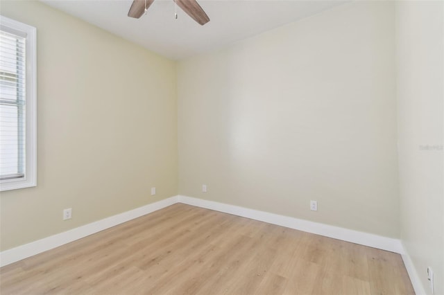 9709 Bay Colony Dr, Riverview, FL 33578 - spare room with ceiling fan, light wood-style flooring, and baseboards