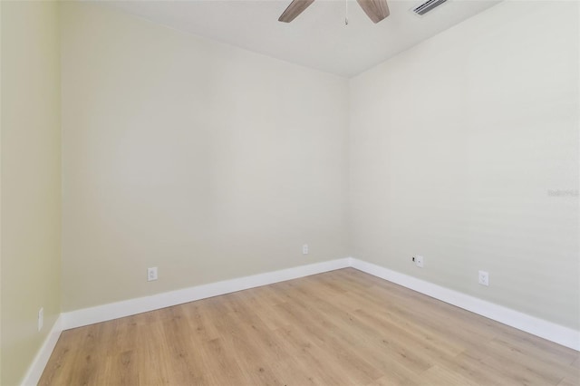 9709 Bay Colony Dr, Riverview, FL 33578 - spare room with ceiling fan, light wood-style flooring, and baseboards
