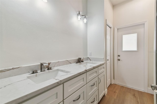 9709 Bay Colony Dr, Riverview, FL 33578 - bathroom with wood finished floors and double vanity