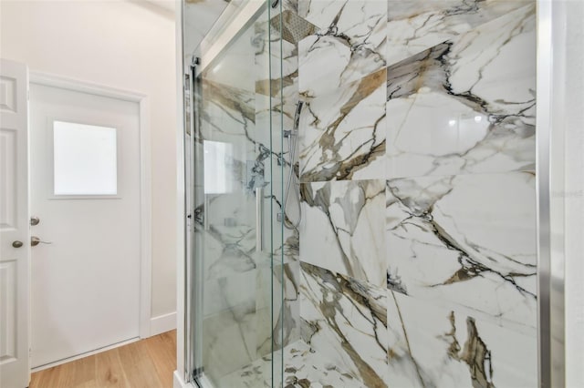 9709 Bay Colony Dr, Riverview, FL 33578 - full bath with a marble finish shower and wood finished floors