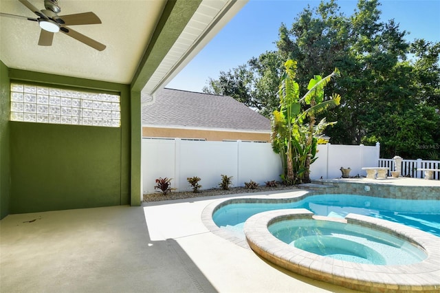 9709 Bay Colony Dr, Riverview, FL 33578 - view of swimming pool featuring ceiling fan, a patio, a fenced backyard, and a pool with connected hot tub