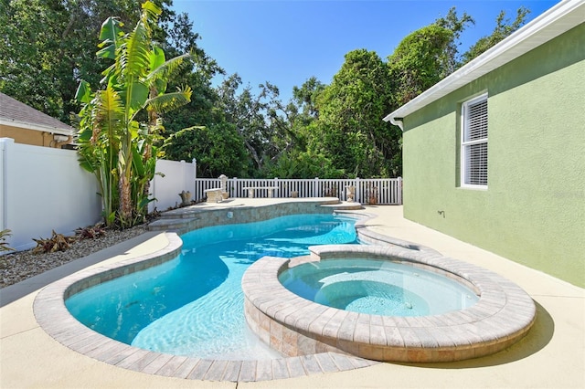 9709 Bay Colony Dr, Riverview, FL 33578 - view of swimming pool with a pool with connected hot tub, a fenced backyard, and view of wooded area