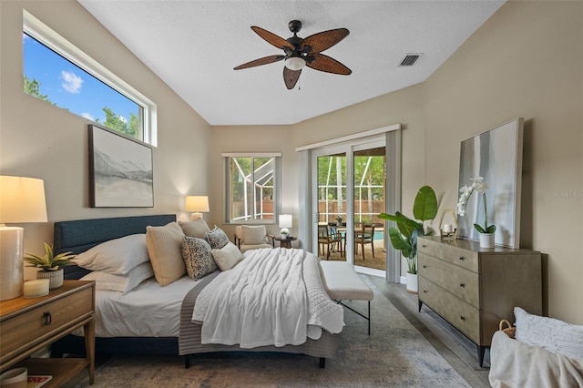 12009 Wandsworth Dr, Tampa, FL 33626 - bedroom featuring access to outside, wood finished floors, and a ceiling fan