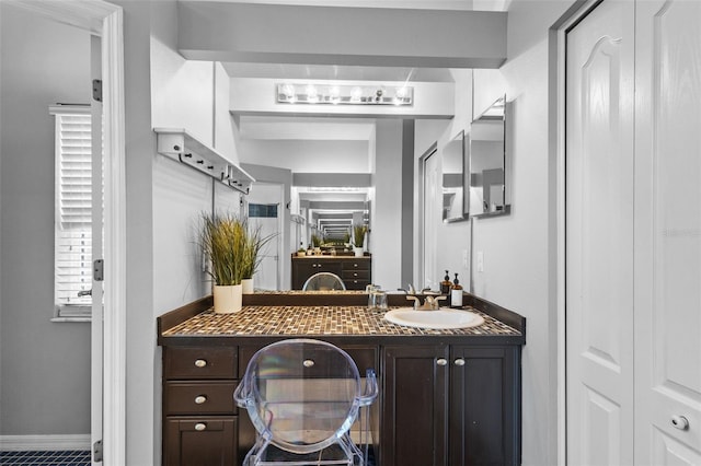 12009 Wandsworth Dr, Tampa, FL 33626 - bathroom featuring vanity and baseboards