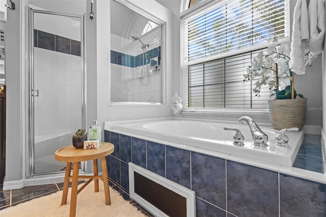 12009 Wandsworth Dr, Tampa, FL 33626 - full bathroom featuring a bath and a stall shower