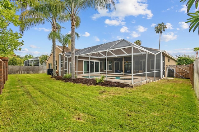 12009 Wandsworth Dr, Tampa, FL 33626 - rear view of property with stucco siding, central AC unit, and a lanai