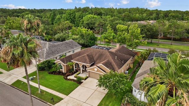 12009 Wandsworth Dr, Tampa, FL 33626 - view of subject property with a forest
