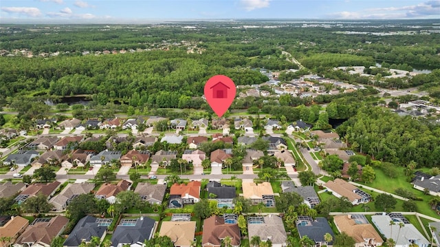 12009 Wandsworth Dr, Tampa, FL 33626 - aerial overview of property's location with a forest and nearby suburban area