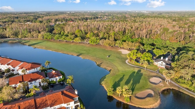 12009 Wandsworth Dr, Tampa, FL 33626 - aerial view of property and surrounding area featuring a forest, a golf club, and a nearby body of water