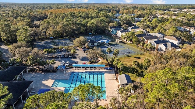 12009 Wandsworth Dr, Tampa, FL 33626 - bird's eye view of a heavily wooded area and a pool