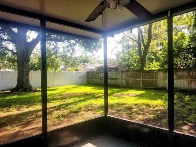 1841 Georgia Ave, Palm Harbor, FL 34683 - unfurnished sunroom featuring ceiling fan