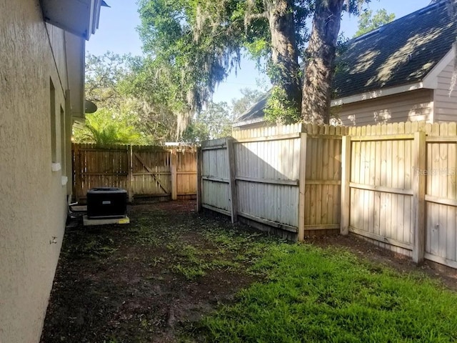1841 Georgia Ave, Palm Harbor, FL 34683 - fenced backyard featuring central AC unit