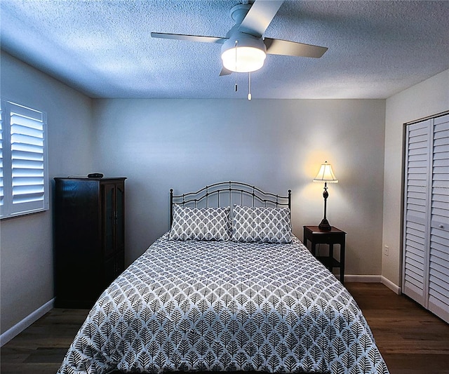 6060 Shore Blvd S Unit 903, Gulfport, FL 33707 - bedroom featuring wood finished floors, baseboards, a textured ceiling, and a ceiling fan
