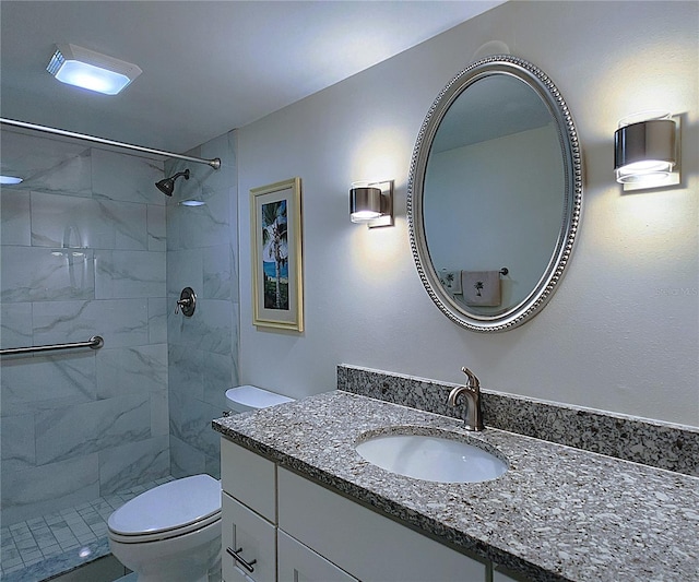 6060 Shore Blvd S Unit 903, Gulfport, FL 33707 - full bathroom featuring toilet, vanity, and a tile shower