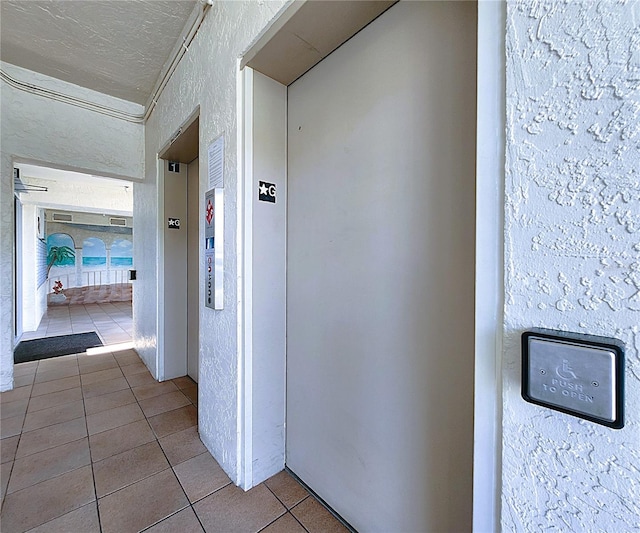6060 Shore Blvd S Unit 903, Gulfport, FL 33707 - corridor with elevator