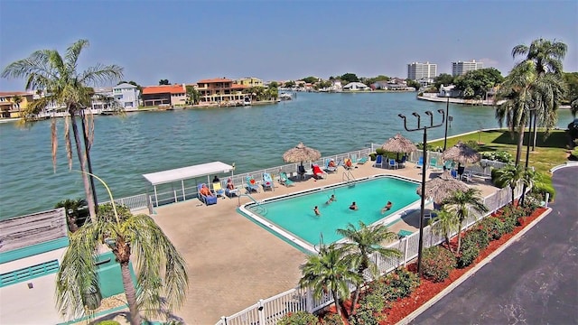 6060 Shore Blvd S Unit 903, Gulfport, FL 33707 - community pool featuring a patio and a water view