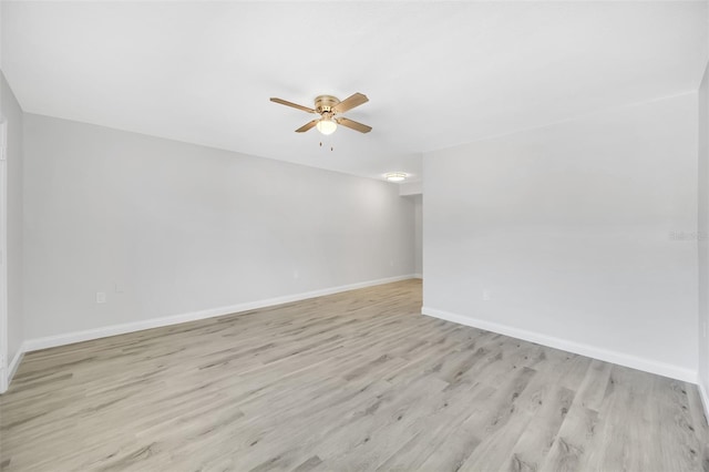 11224 82nd Ave Unit 104, Seminole, FL 33772 - unfurnished room with a ceiling fan, light wood-type flooring, and baseboards