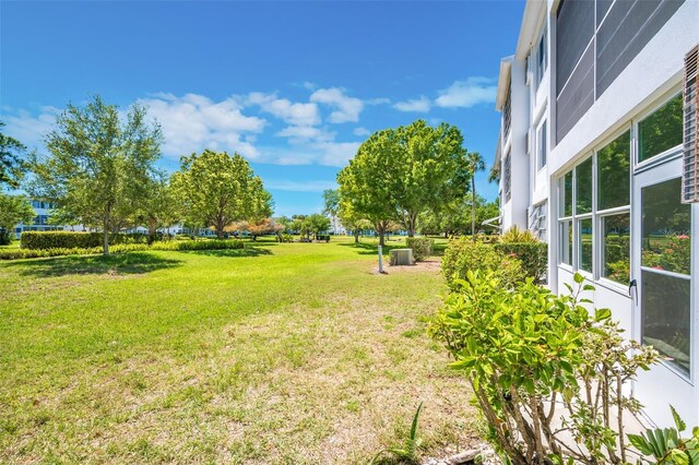 11224 82nd Ave Unit 104, Seminole, FL 33772 - view of grassy yard