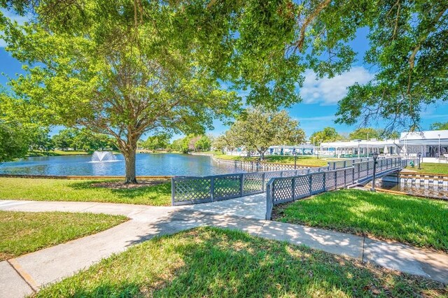 11224 82nd Ave Unit 104, Seminole, FL 33772 - view of yard with a water view
