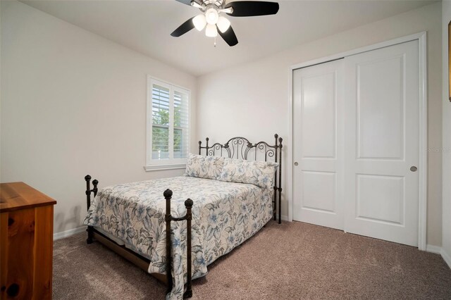 5102 Coastal Scene Dr, Apollo Beach, FL 33572 - bedroom featuring carpet floors, baseboards, a closet, and a ceiling fan