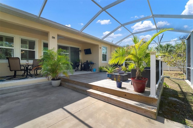 5102 Coastal Scene Dr, Apollo Beach, FL 33572 - view of patio / terrace with a wooden deck and a lanai