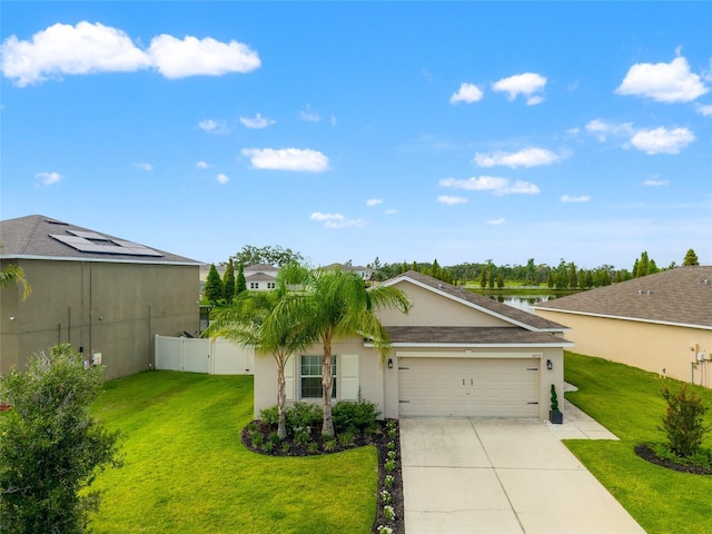 10512 Fuzzy Cattail St, Riverview, FL 33578 - ranch-style house featuring a garage, stucco siding, and driveway
