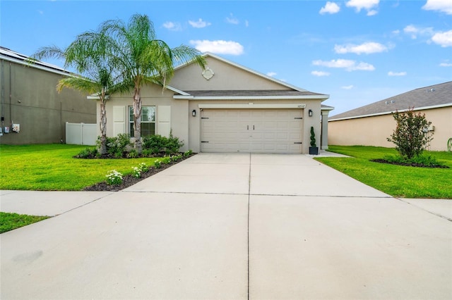 10512 Fuzzy Cattail St, Riverview, FL 33578 - ranch-style home featuring stucco siding, a garage, and driveway