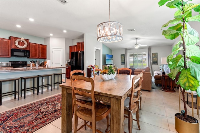 10512 Fuzzy Cattail St, Riverview, FL 33578 - dining room featuring recessed lighting, a chandelier, light tile patterned floors, and a ceiling fan
