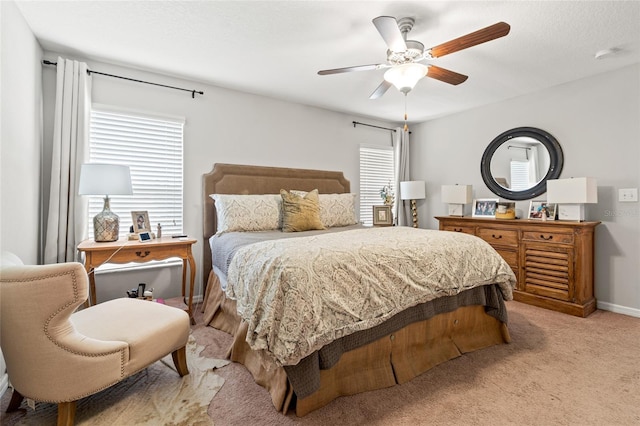 10512 Fuzzy Cattail St, Riverview, FL 33578 - bedroom with light colored carpet, ceiling fan, and baseboards