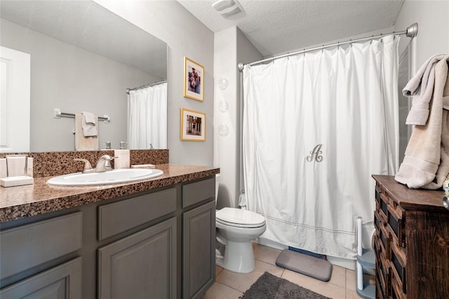 10512 Fuzzy Cattail St, Riverview, FL 33578 - bathroom featuring vanity, toilet, tile patterned flooring, shower / bathtub combination with curtain, and a textured ceiling