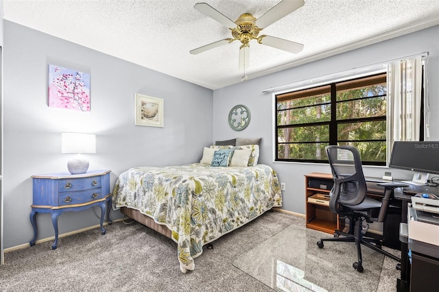 2919 Fig Ct, Palm Harbor, FL 34684 - bedroom with a textured ceiling, a desk, baseboards, and carpet flooring