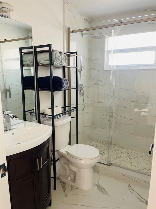 4049 Ponea Dr, Sarasota, FL 34241 - full bathroom featuring toilet, vanity, and a marble finish shower