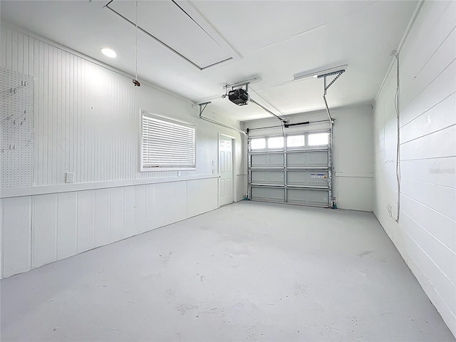 9929 Bay Dr, Gibsonton, FL 33534 - garage featuring a garage door opener