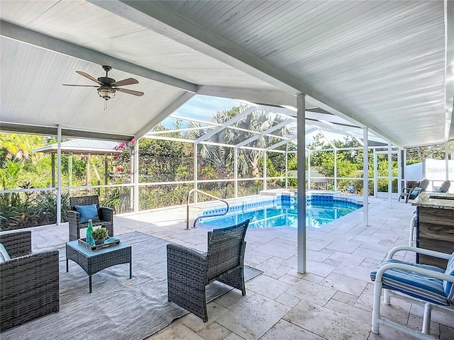 9929 Bay Dr, Gibsonton, FL 33534 - outdoor pool featuring a ceiling fan, a patio, a lanai, and outdoor lounge area