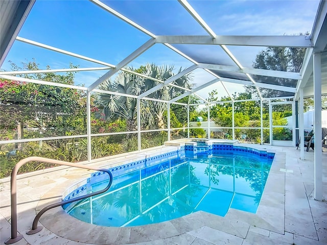 9929 Bay Dr, Gibsonton, FL 33534 - view of swimming pool with a pool with connected hot tub, a patio area, and glass enclosure