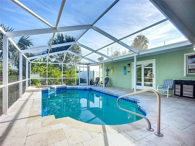 9929 Bay Dr, Gibsonton, FL 33534 - view of pool with a patio, a lanai, and a pool with connected hot tub