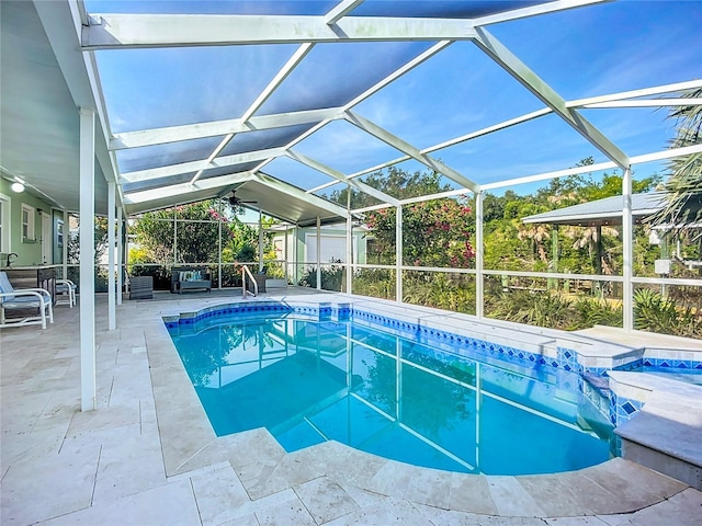9929 Bay Dr, Gibsonton, FL 33534 - view of swimming pool featuring a patio area, a lanai, and a pool with connected hot tub