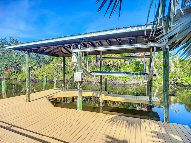 9929 Bay Dr, Gibsonton, FL 33534 - dock area with boat lift and a water view