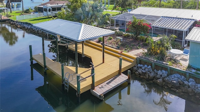 9929 Bay Dr, Gibsonton, FL 33534 - dock with a water view, glass enclosure, and boat lift