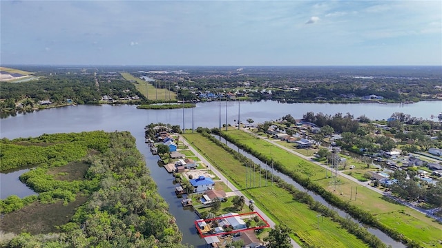 9929 Bay Dr, Gibsonton, FL 33534 - aerial overview of property's location featuring a large body of water and property boundaries highlighted