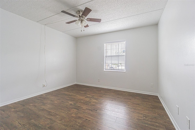 4708 Michael Ct Unit 103, Tampa, FL 33614 - spare room featuring a ceiling fan, wood-type flooring, a textured ceiling, and baseboards