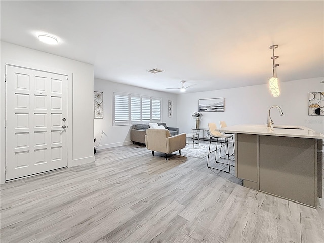 7125 S Shore Dr S, Saint Petersburg, FL 33707 - living area with light wood finished floors and baseboards