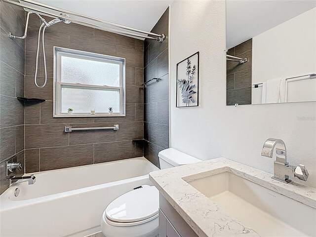 7125 S Shore Dr S, Saint Petersburg, FL 33707 - bathroom featuring toilet, vanity, and shower / tub combination