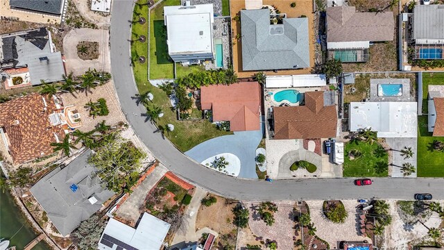 7125 S Shore Dr S, Saint Petersburg, FL 33707 - aerial view of residential area with a pool